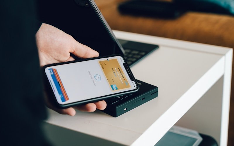 Person managing utility payment on smartphone