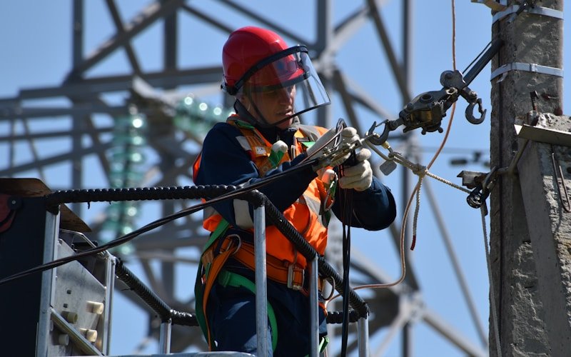 Technician setting up utility services